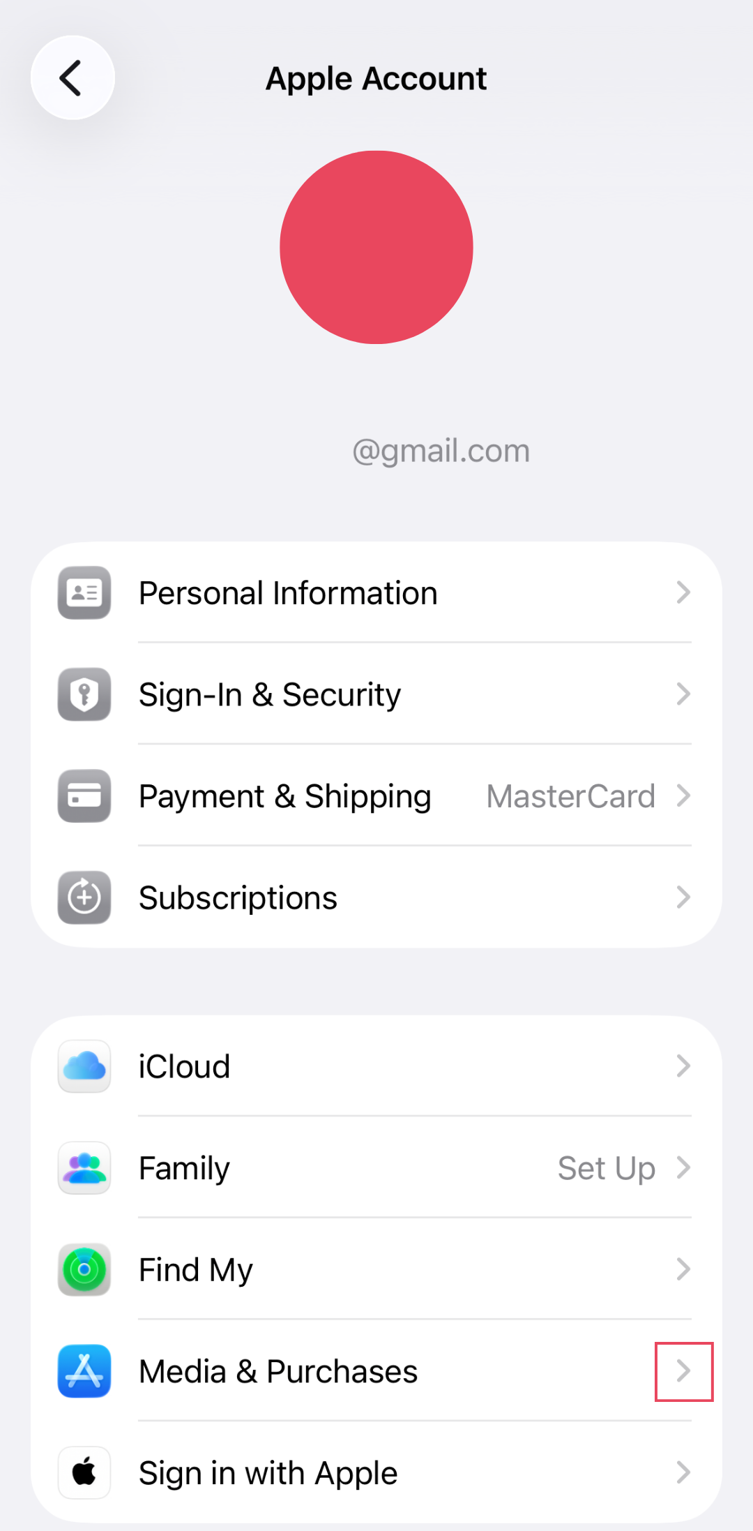 Apple Account settings with Media and Purchases highlighted