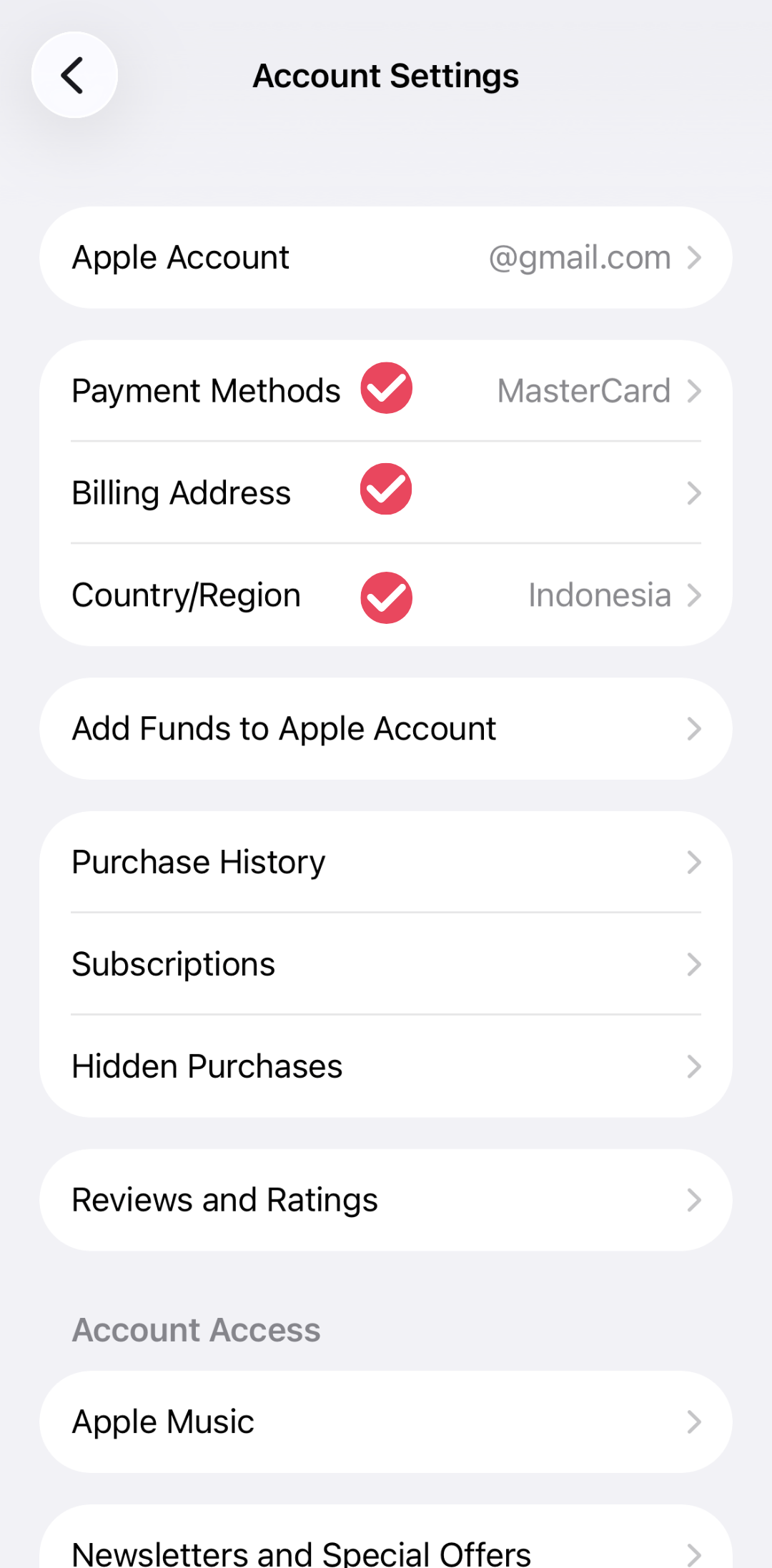 Apple Account settings showing country or region, billing address, and payment method details