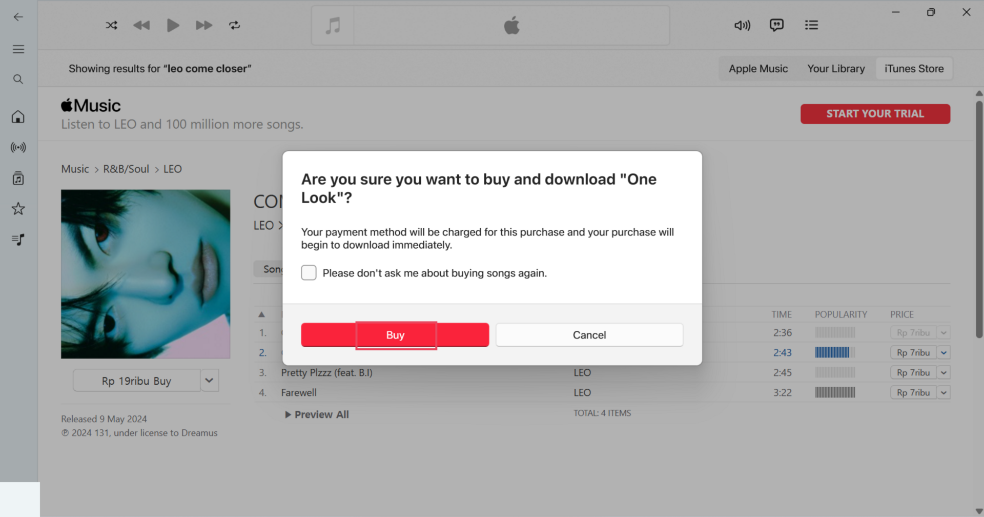 iTunes Store purchase confirmation dialog with the Buy button highlighted